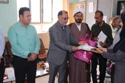 تجلیل فرماندار گناوه از معلمان زحمتکش مدرسه شهید مطهری روستای شول